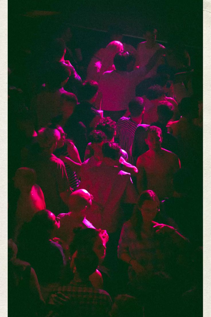 Crowd under magenta lights